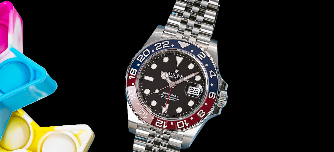 Edited Rolex GMT Pepsi 126710BLRO watch with Black Background